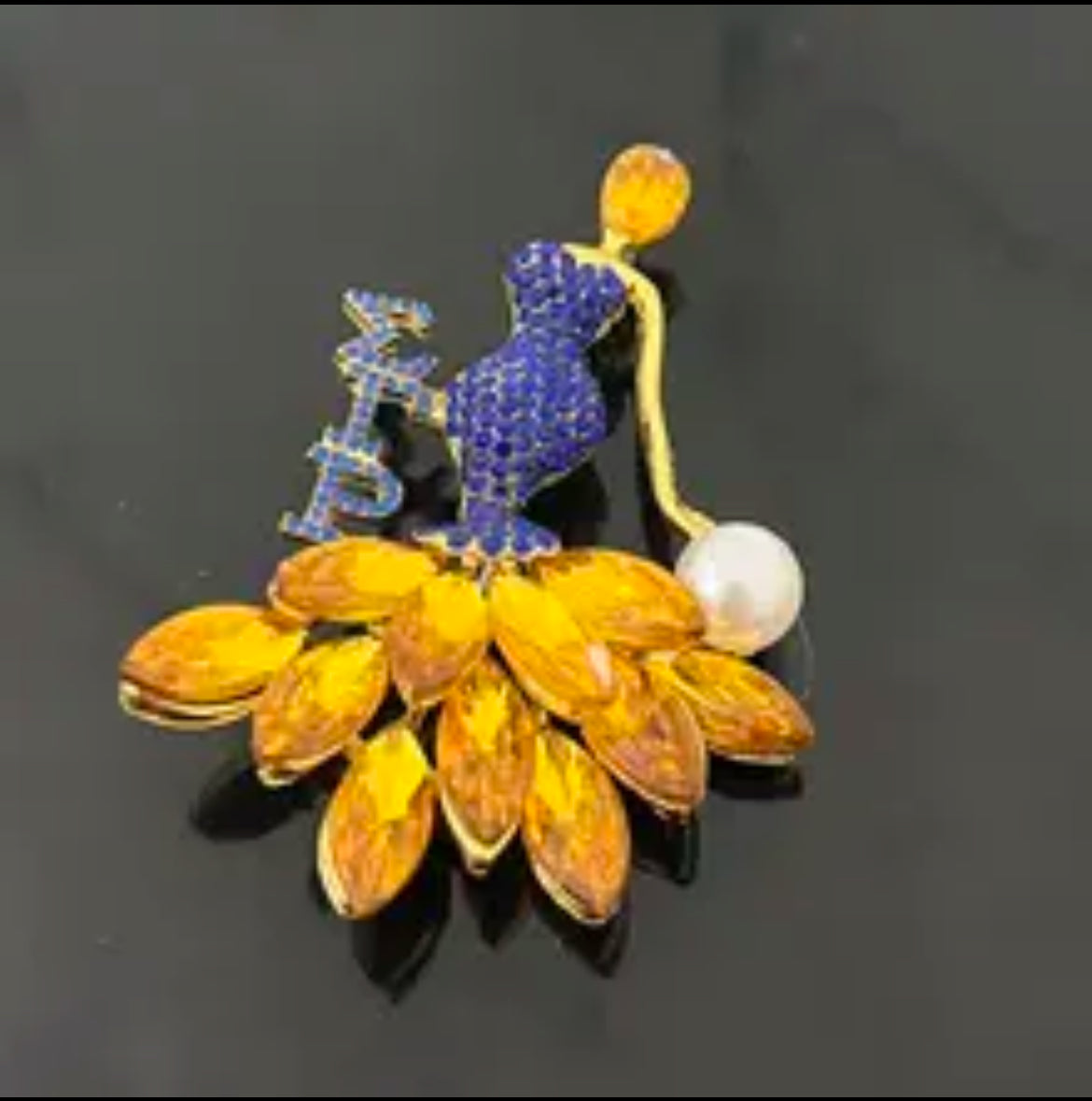 SGRho Brooch